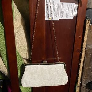 Elegant White Clutch with Gold Chain